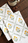 Golden Bloom Tea Towel