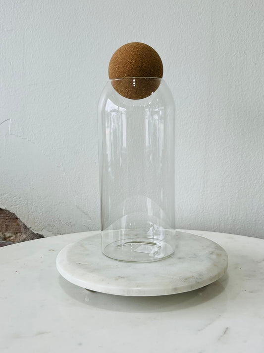 tall glass jar with ball